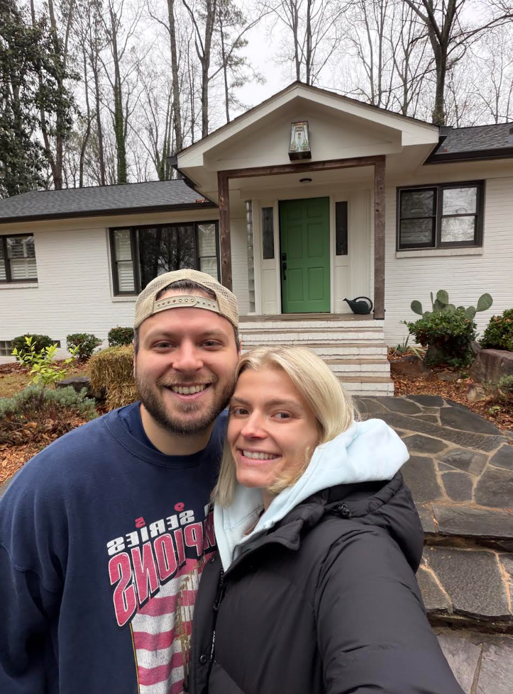 Allison and Jacob outside their first house